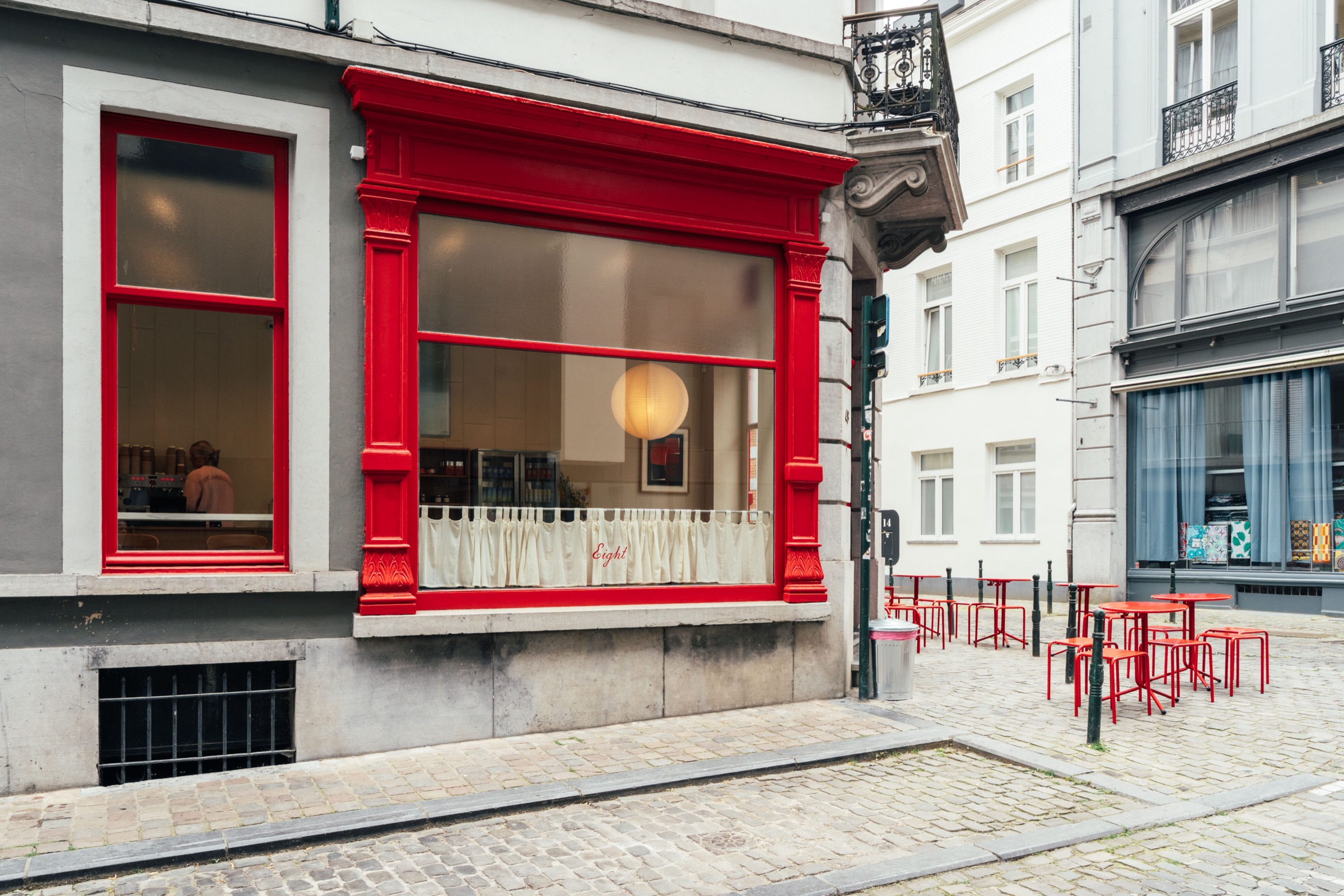 Eight's red storefront in Brussels